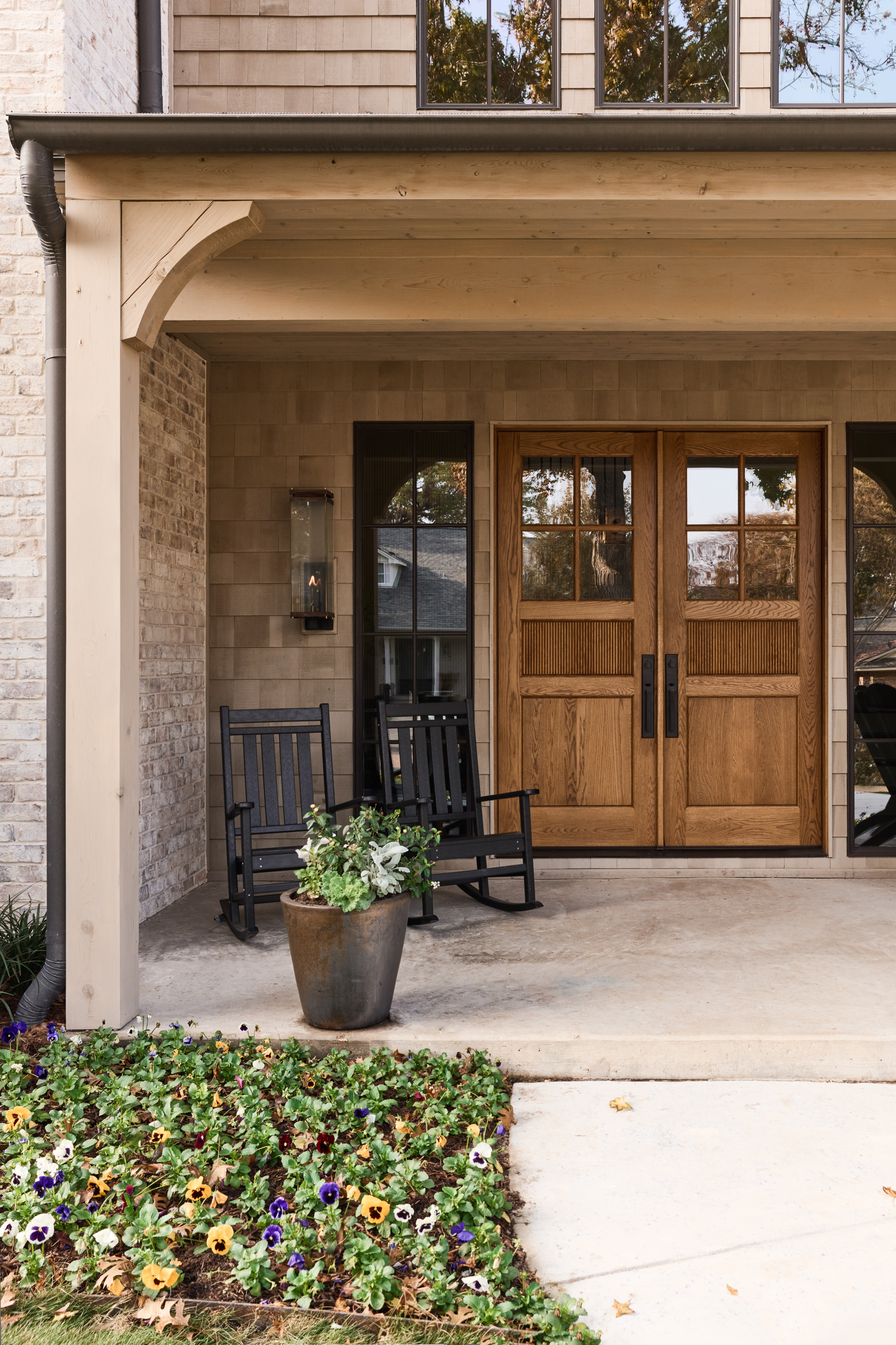 Meadowglen entry porch with warm oak doors